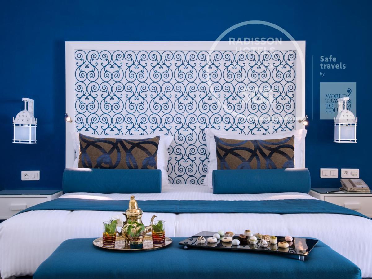 哈马迈特海水浴度假丽笙布鲁酒店 哈馬馬特 外观 照片 A bedroom at Radisson Blu Hotel, Marrakech
