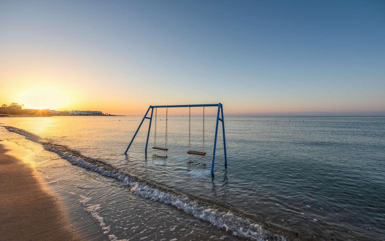 哈马迈特海水浴度假丽笙布鲁酒店 哈馬馬特 外观 照片 Sunset at the beach