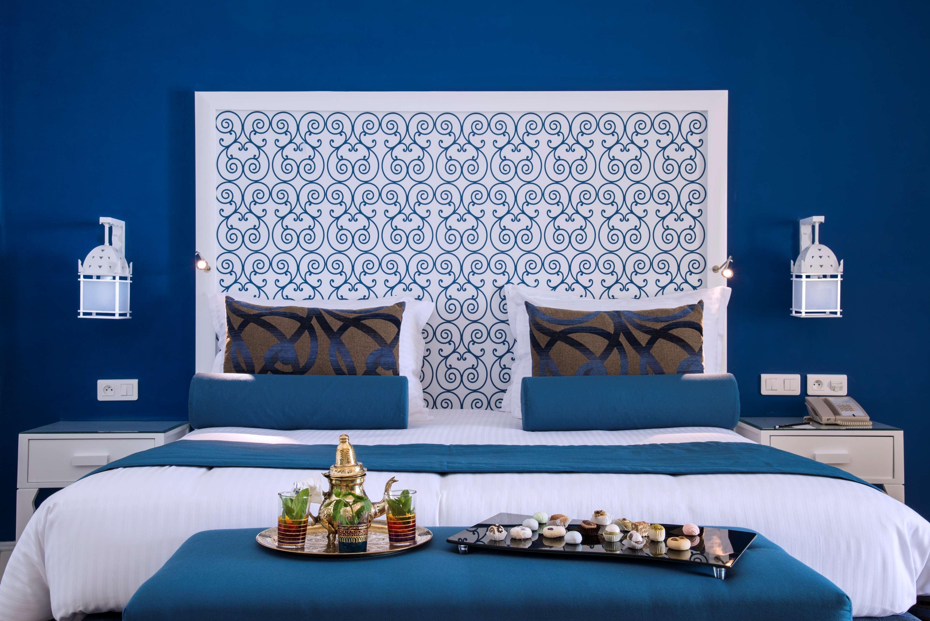 哈马迈特海水浴度假丽笙布鲁酒店 哈馬馬特 外观 照片 A bedroom at the hotel
